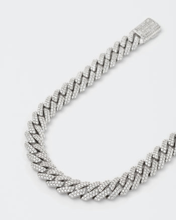 detail of 18k white gold coated mini prong chain necklace with hand-set micropavé stones in white